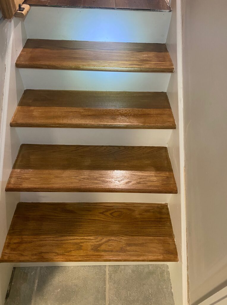 Wood stair treads after staining and finishing